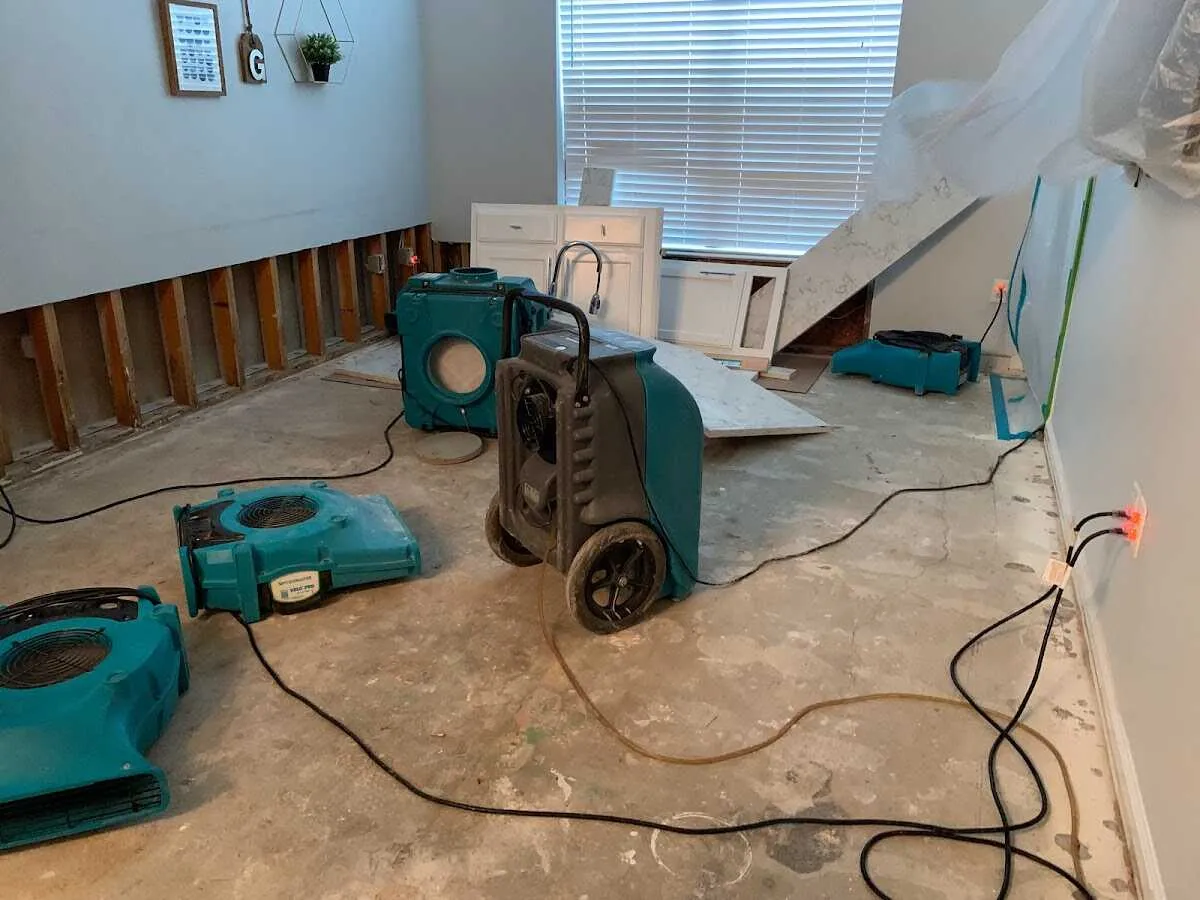 Dehumidifier in flood-cut room for Water Damage Restoration in Frederickson
